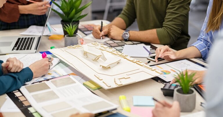 architects-working-on-building-scale-model